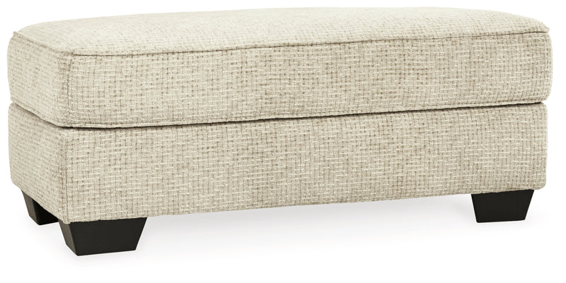 Sillón y otomana Monaghan