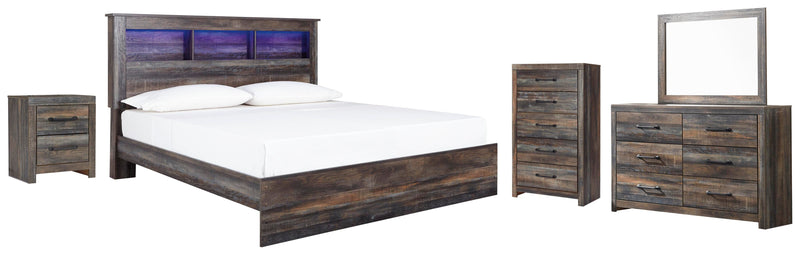 Dormitorio Drystan con cama y librería de paneles