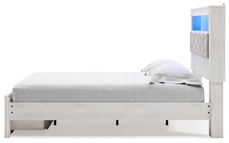 Cama tapizada Altyra con estantería y almacenamiento