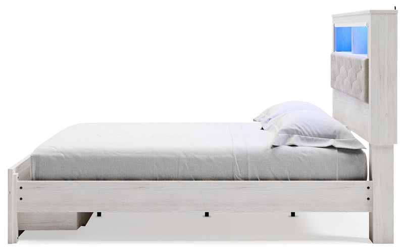 Cama tapizada Altyra con estantería y almacenamiento