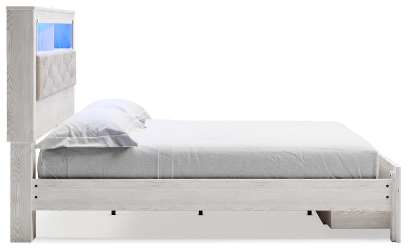 Cama tapizada Altyra con estantería y almacenamiento
