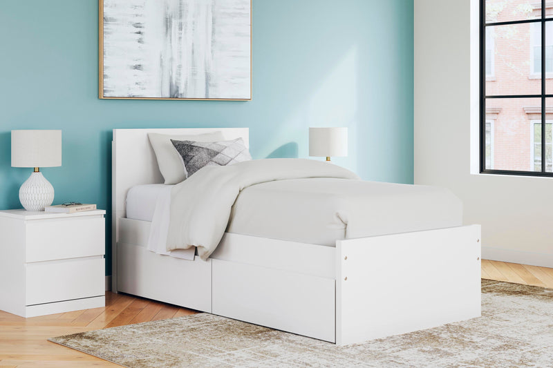 Cama con plataforma Onita con 1 compartimento de almacenamiento lateral