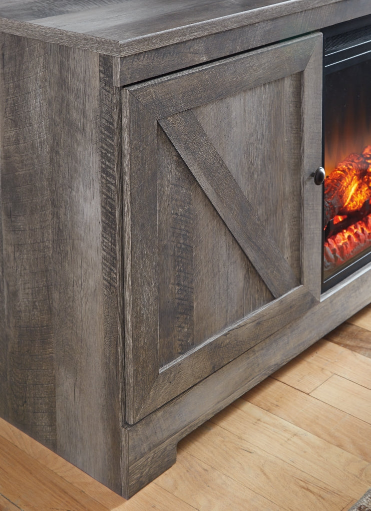 Mueble para TV Wynnlow de 63" con chimenea eléctrica